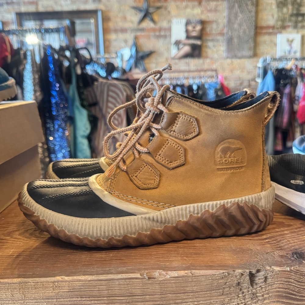 Sorel Tan and Black Winter Boots